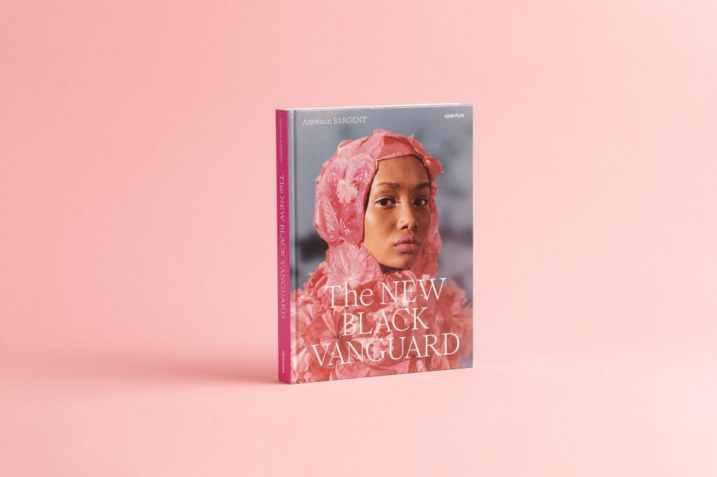 A book cover with a photograph of a women in a headscarf