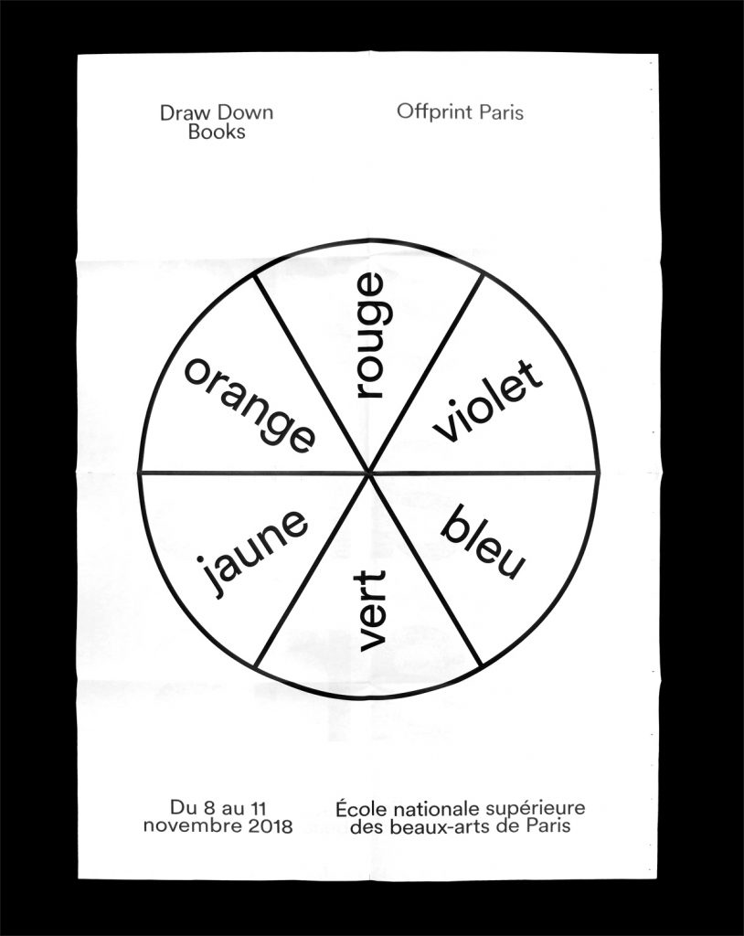 A black and white poster with a pie chart filled with different colors.