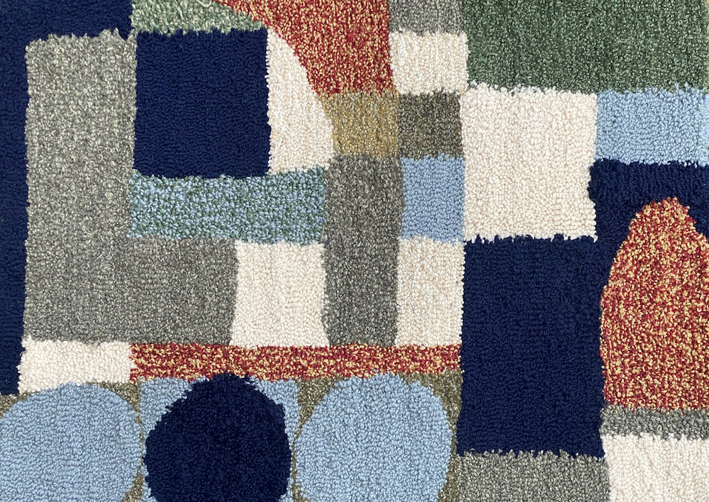 Pale colored tufted rug