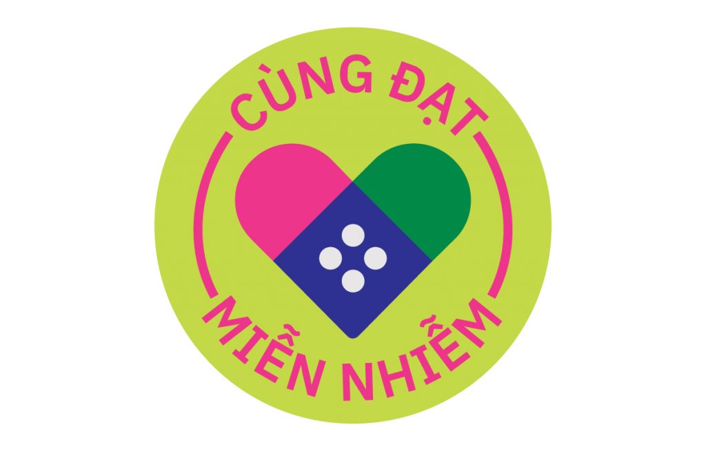 A green sticker with Vietnamese text around a symbol of two bandaids forming a heart.